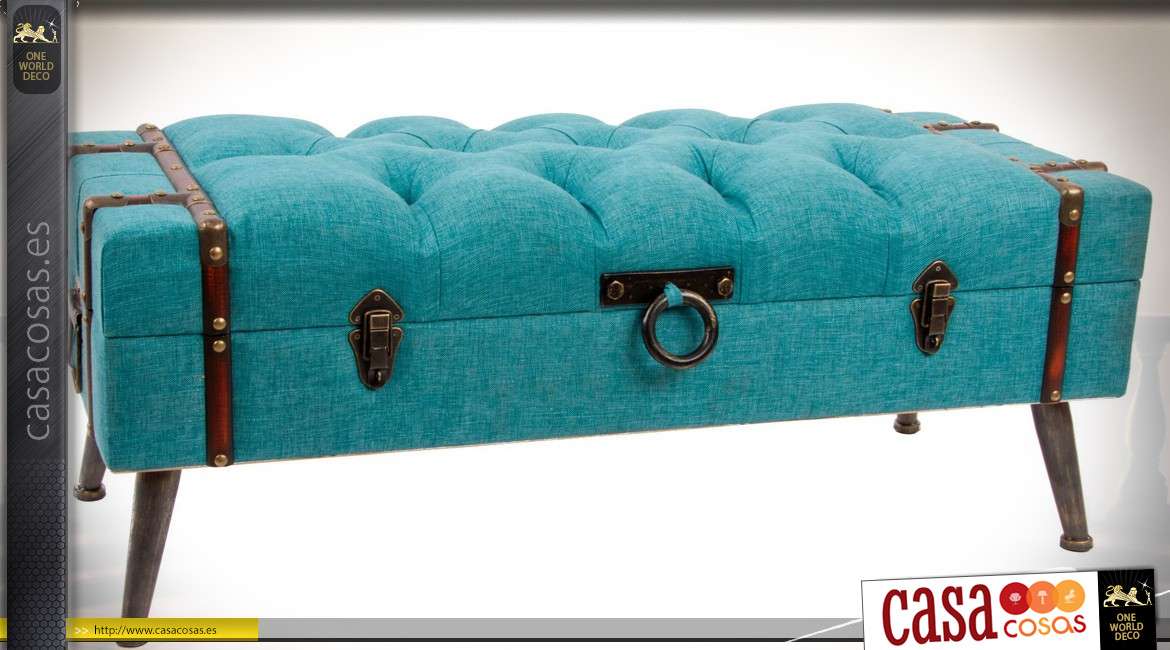 Extremo de cama tapizada de tela turquesa