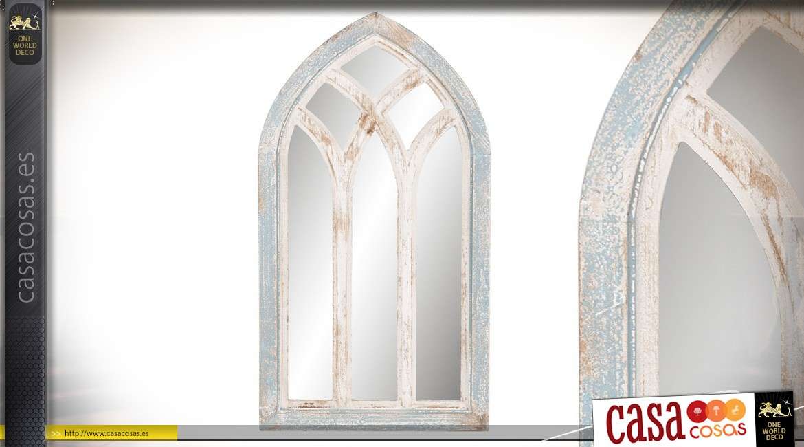 Espejo de madera de estilo gótico antiguo con reflejos turquesas vintage