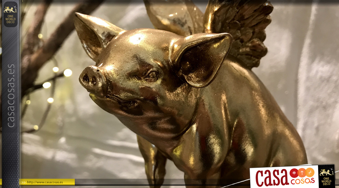 Escultura de cerdo alado sobre peana, en resina y metal acabado oro viejo, 21cm