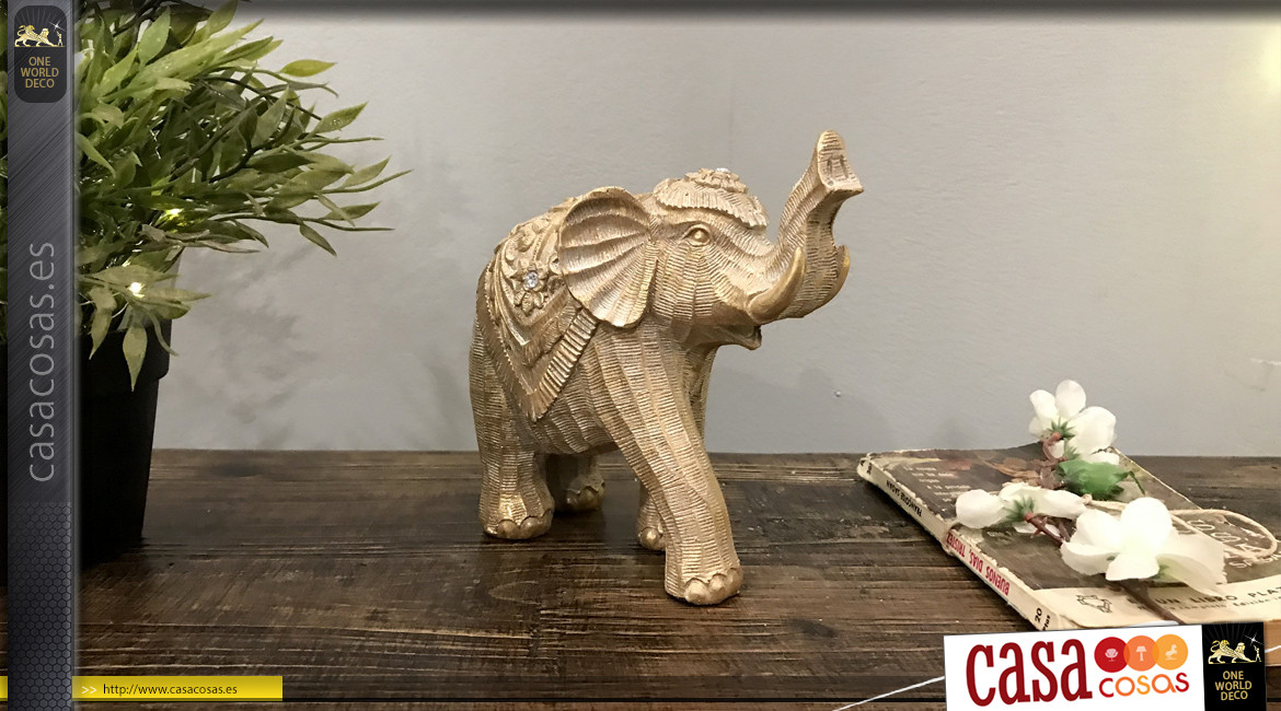 Estatuilla de elefante en resina efecto madera tallada, reflejos dorados sobre fondo cepillado, 17cm