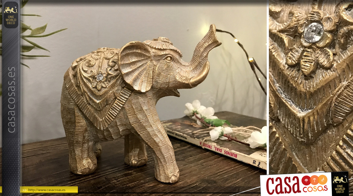 Estatuilla de elefante en resina efecto madera tallada, reflejos dorados sobre fondo cepillado, 17cm