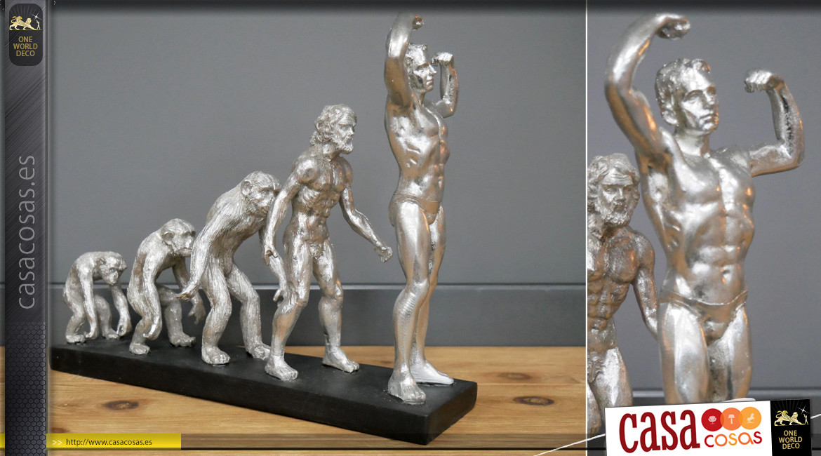 Estatuilla moderna de la evolución, en resina con acabado plateado envejecido y base de carbón negro, 33cm.