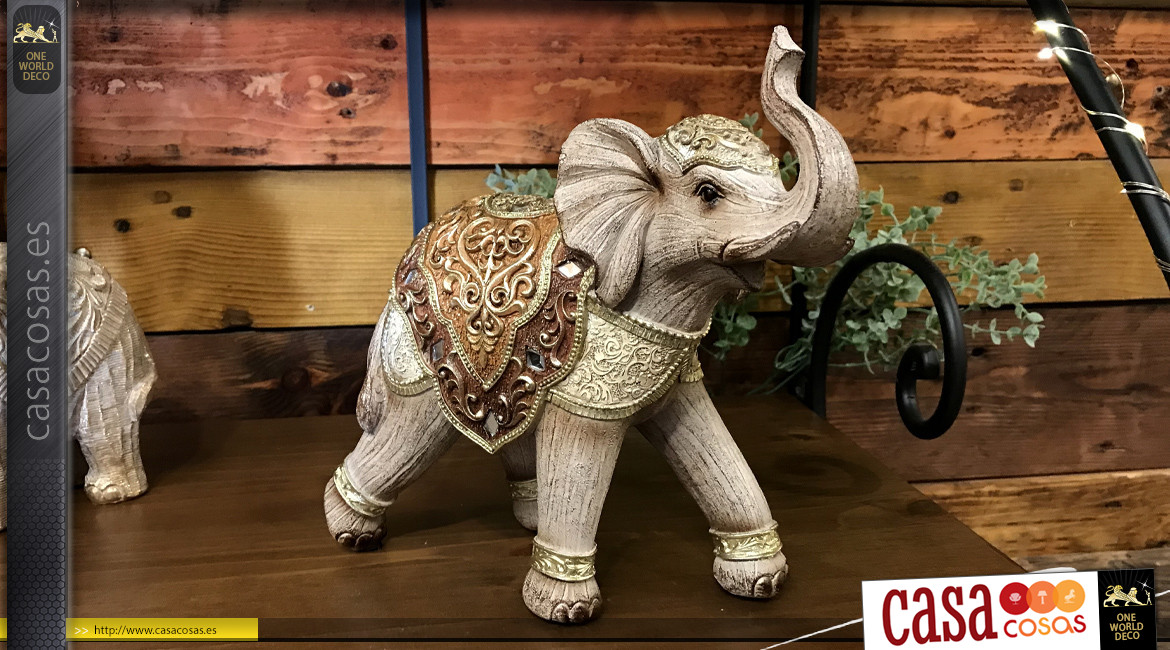 Representación de elefante con vestido oriental, acabado dorado y facetas espejadas, en resina efecto madera tallada, 24cm