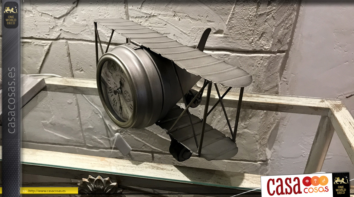 Avión biplano de los años 20 en metal acabado zinc con reloj central, 32cm