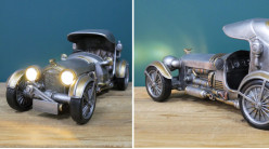 Representación en resina de un coche antiguo estilo steampunk, con faros, acabado latón gris y dorado, 33cm