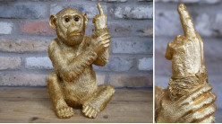 Escultura de mono en resina acabado dorado, ambiente desenfadado y rebelde, 30cm