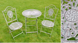 Conjunto de jardín para 2 personas en metal acabado gris envejecido, mesa redonda y sillas decoradas con medallones, Ø60cm