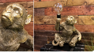Lámpara moderna y original de resina, forma de mono con toma de corriente, acabado dorado
